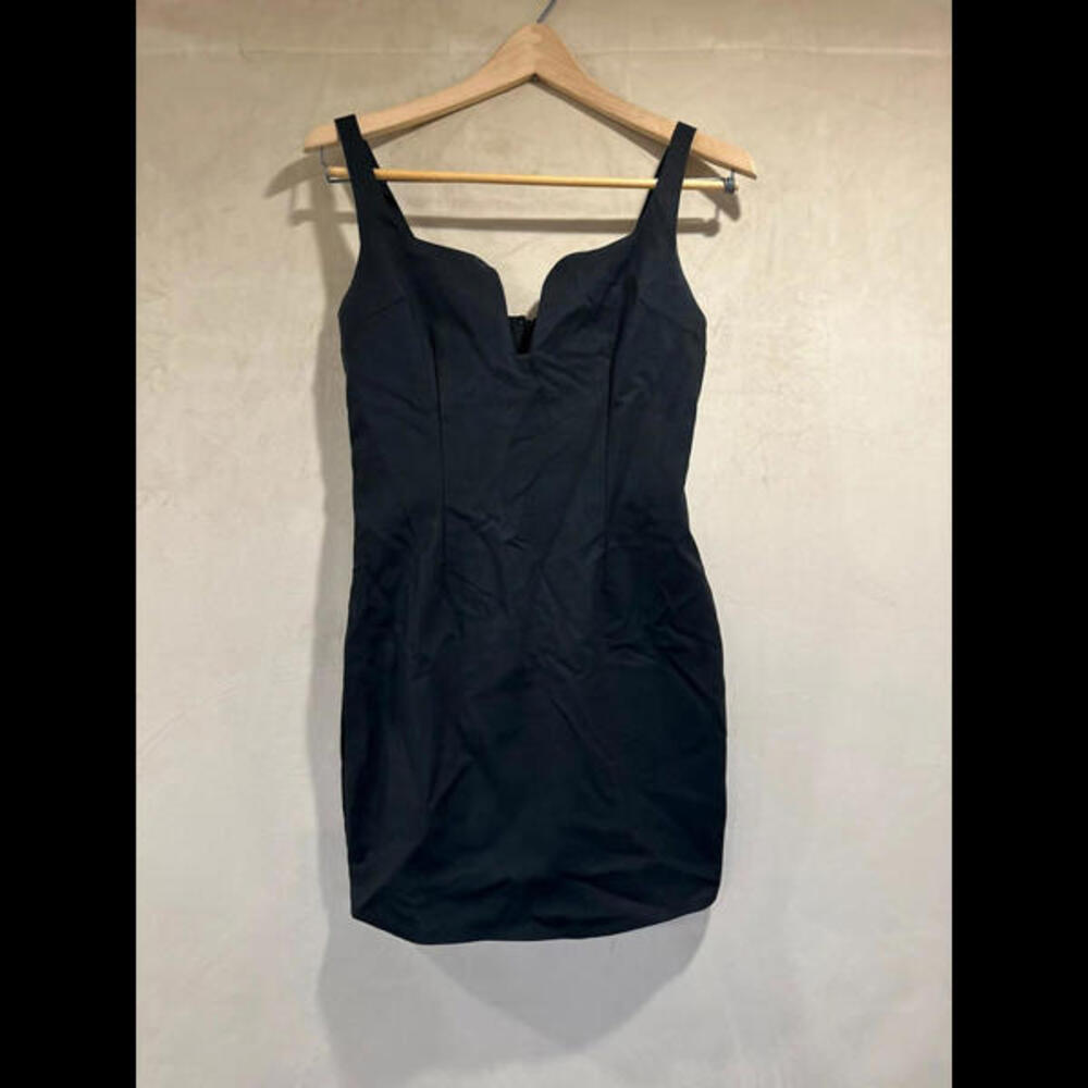 Nice all black dress. Brand: “by the way.”